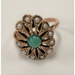 A gold turquoise and seed pearl set ring, size I/J, weight 2.9g approx (one pearl missing).