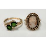 Two 9ct gold rings, one set with two green stones, the other a shell cameo, weight 6.5g approx.