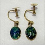 Pair of 9ct gold blue opal drop earrings, each of the oval opals 1.5ct spread approx, with screw
