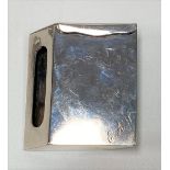 Unusual white metal matchbox case with hinged cover of trapezium form, with engraved monogram E.A.P,