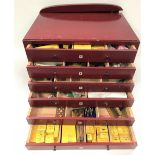 Meccano parts storage cabinet with six drawers and containing boxed Meccano spares and various other