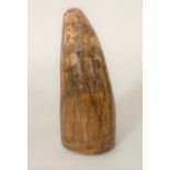 A 19th century scrimshaw sperm whale tooth engraved with a woman with bow and arrow, height 9.5cm