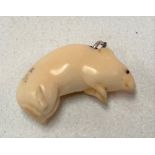 A Meiji period Japanese ivory miniature rat, signed with two character marks, length 18mm, with