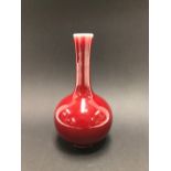 Chinese Sang de Boeuf bottle vase, height 20cm.