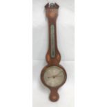 A mahogany marquetry inlaid aneroid banjo barometer thermometer, the silvered dial signed J.