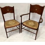 An Arts & Crafts inlaid bedroom elbow chair and matching chair, the shaped plank back inlaid with