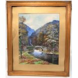 JOHN BARAGWANATH KING (1864-1939) River landscape with stone bridge Gouache Signed 52 x 41cm