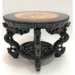 Small Chinese circular hardwood low two tier table, the circular top with marble inset and with