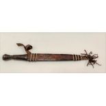 African tribal short sword with leather covered grip and steel blade, the sheath with punched zigzag