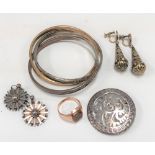 A collection of costume jewellery, including a yelllow metal stone set signet ring, a Mexican silver