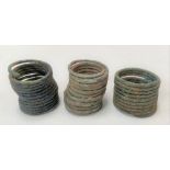 Three Viking bronze coiled rings.