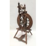A small elm spinning wheel, height 80cm