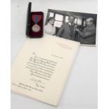 Elizabeth II Imperial Service medal within case by The Royal Mint awarded to Philip Raymond