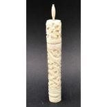 A 19th Century Cantonese carved ivory cylindrical needle holder carved with a coiled dragon and