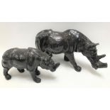 Two leather models of rhinos, the largest width 45cm, the smallest width 30cm (2).