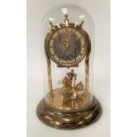 A torsion timepiece under glass dome by Shatz, height 22cm