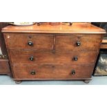 A Victorian mahogany straight-front chest of two short over two long drawers with ebony turned