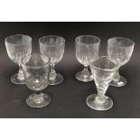 Set of three 19th Century wine glasses, the bowls with oval cuts; together with three other