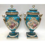 An impressive pair of early 19th century Sevres porcelain Neo-Classical lidded pedestal vases in