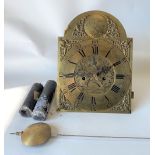 An eight day long case clock movement, the 12in brass arched dial signed Chas Dollorn South Cave,
