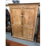Victorian stripped pine two section hall cupboard, height 186cm x width 130cm.