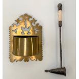A silver plated candle snuff with ivory knopped handle, length 28.5cm; together with a brass wall