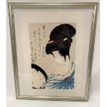 Japanese wood block print of a lady looking into a mirror, with calligraphy inscription, 37cm x 24.