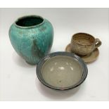 A studio pottery stoneware bowl with brushwork decoration in blue and tenmoku upon an ash ground,