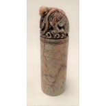 A Chinese soapstone cylindrical desk seal, the top carved with a fo dog, the exterior incised with a
