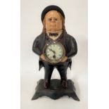 A Bradley & Hubbard figural novelty John Ball moving eye cast iron timepiece, height 38cm.