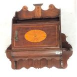 An Edwardian Sheriton Revival mahogany marquetry inlaid wall-hanging cupboard, the raised back