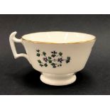 Victorian Swansea London shape tea cup, floral painted, with gilt rim, diameter 10.5cm.