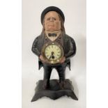 A Bradley & Hubbard novelty John Ball moving eye cast iron clock case with quartz movement, height