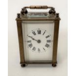 A small carriage timepiece, with 1.5in dial, height including handle 11cm