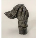 A bronze walking stick handle cast as the head of a hound, height 7.5cm