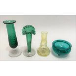 Two Victorian green glass wrythen fluted spill vases; together with a Victorian green glass small