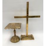 A brass church cross upon a rectangular stand, height 53cm, together with a brass pedestal trivet (