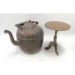 A copper kettle, height 29cm; together with a brass trivet, diameter 17cm
