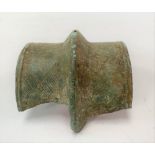 Viking bronze cuff with wriggle line and dot decoration and with raised mid section, width 6.5cm.