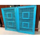 Pair of Indian blue painted bed ends with bobbin trellis panel, width 104cm.