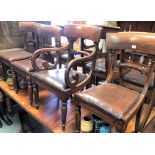 Set of eight early Victorian mahogany dining chairs with leather drop-in seats and on turned and