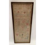 A small coloured woolwork sampler, decorated with the alphabet and the date 1826, 50 x 19cm.