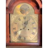 An eight day long case clock with 11in arched dial and within mahogany case, height 212cm