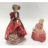 Royal Doulton lady figure 'Top O'The Hill' H.N. 334; together with a Royal Doulton girl figure '