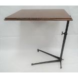 An adjustable reading stand with cast iron base, width 66cm.