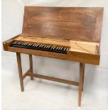 Modern clavichord within walnut case with 58 keys, width 120cm.