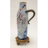 A Royal Worcester aesthetic design vase, the body blue and white transfer printed with a landscape
