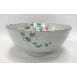 18th Century Chinese bowl decorated with a trellis garden and rocks issuing chrysanthemum, the
