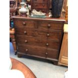 George III mahogany straight front chest of two short over three long graduated drawers upon bracket