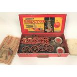 An A.C. Gilbert Company 'new erecter' set within original tin box with booklet, width 41.5cm